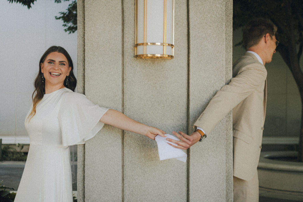 bride and groom exchanging love notes
