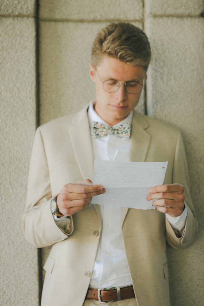 groom reads love letter from bride