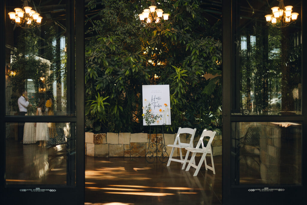 entrance to halli and tucker's garden wedding reception