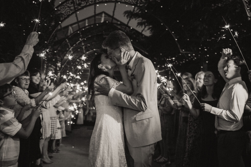 black and white couples sparkler exit