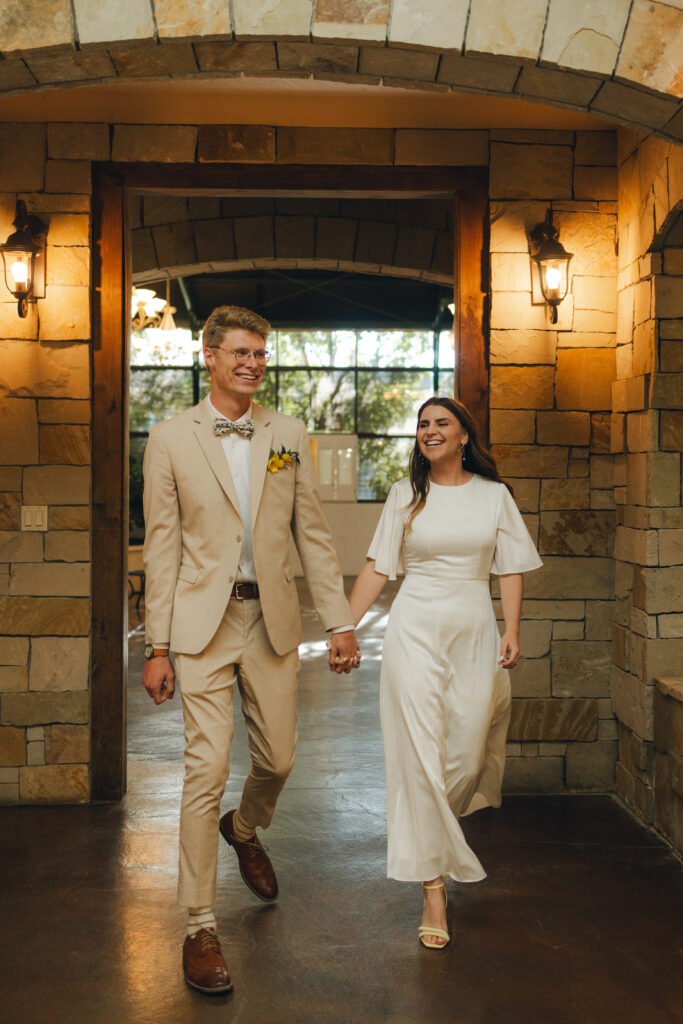 bride and groom make their entrance into the reception