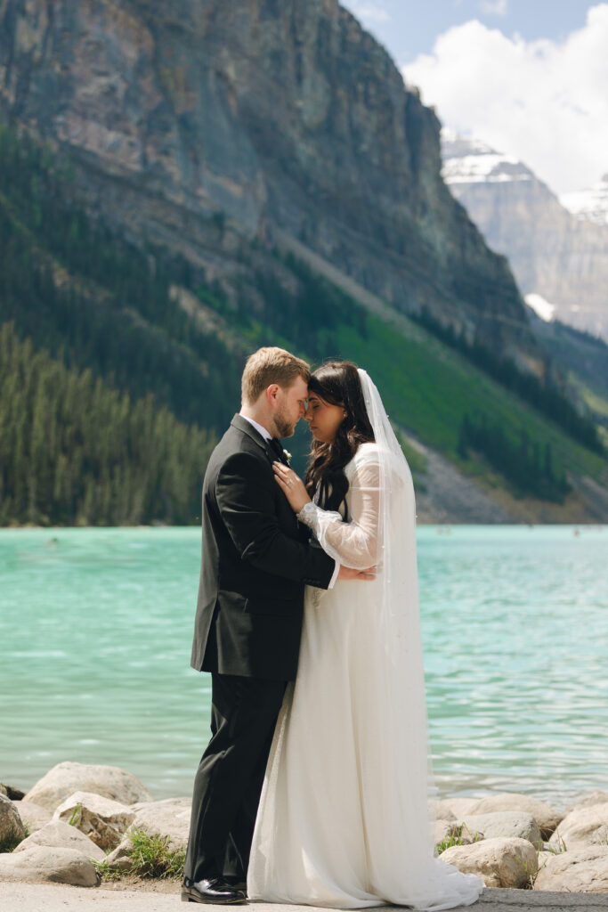 bride and groom at lake louise
